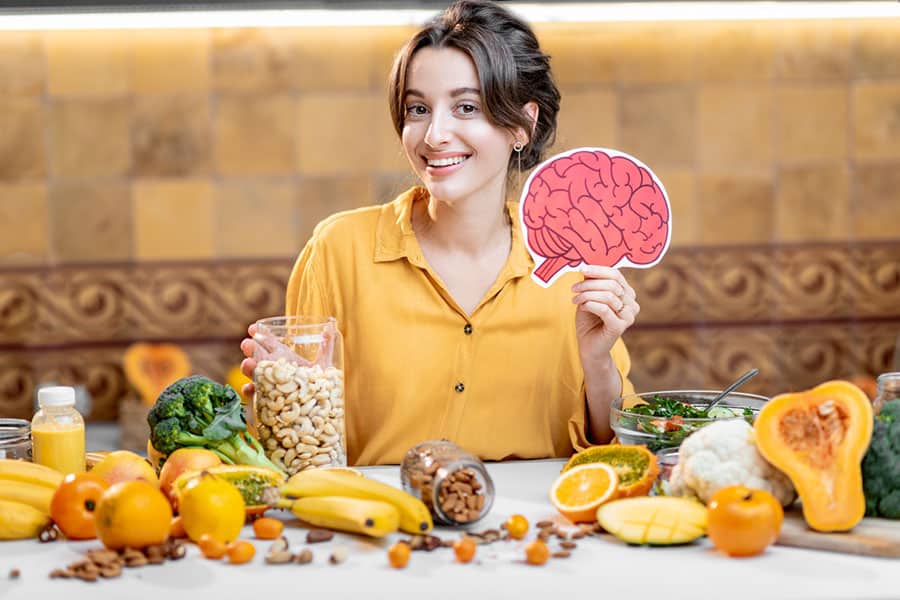 A woman with healthy foods that improve brain power