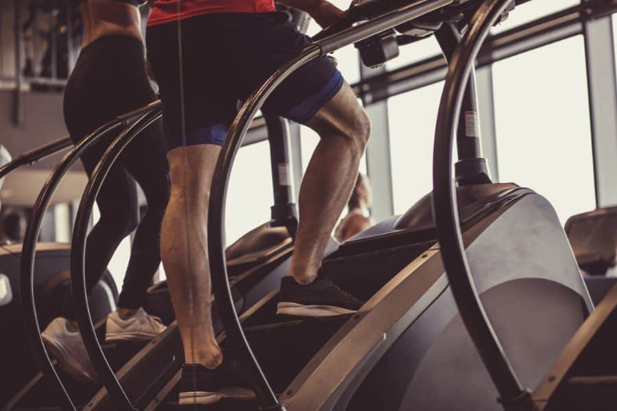 A fitness enthusiast is working out on a Stairmaster machine
